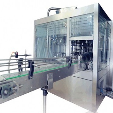Rotary Monoblock Weigh- Metric Filler Machine photo